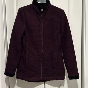 Purple Warm Jacket with black trim at neck and cuffs. Good pre owned condition.